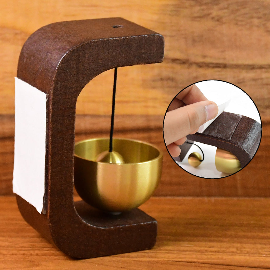 Zen Bell displayed as a decorative wooden and brass meditation chime