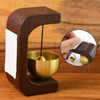 Zen Bell displayed as a decorative wooden and brass meditation chime