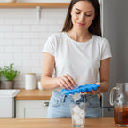 Reusable silicone ice cube tray in blue color for drinks