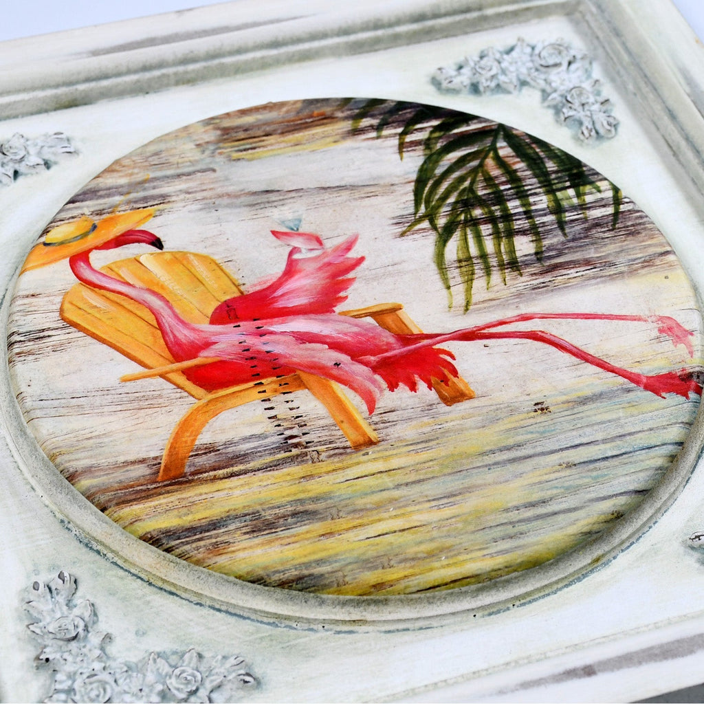 Styled 12x12 inch picture frame holding a vibrant art print.