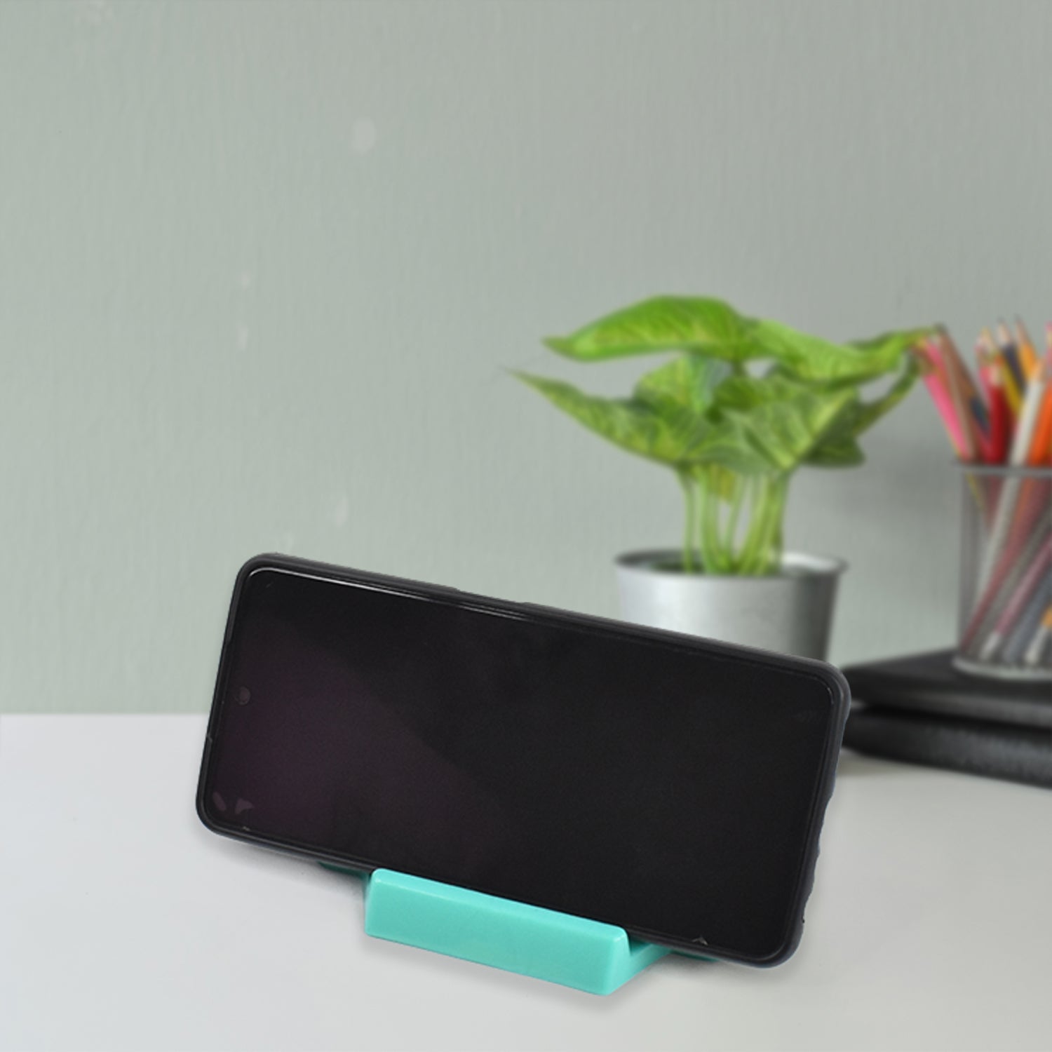 Rectangular slot of mobile holder to fix charging cable