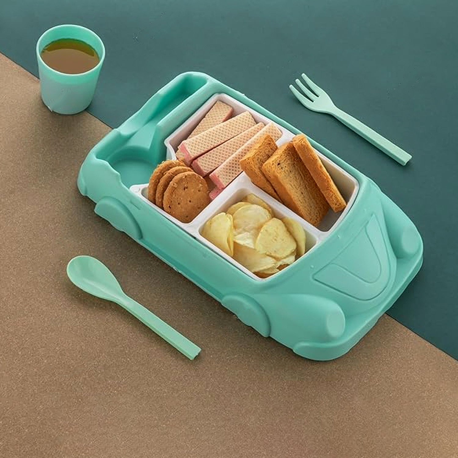 Detailed view of the three distinct compartments within the kids car plate for balanced meals.