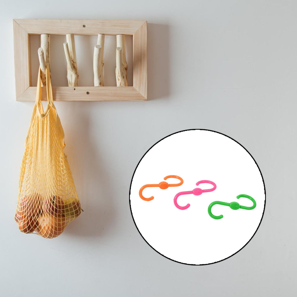 Plastic S hooks holding clothes and accessories neatly