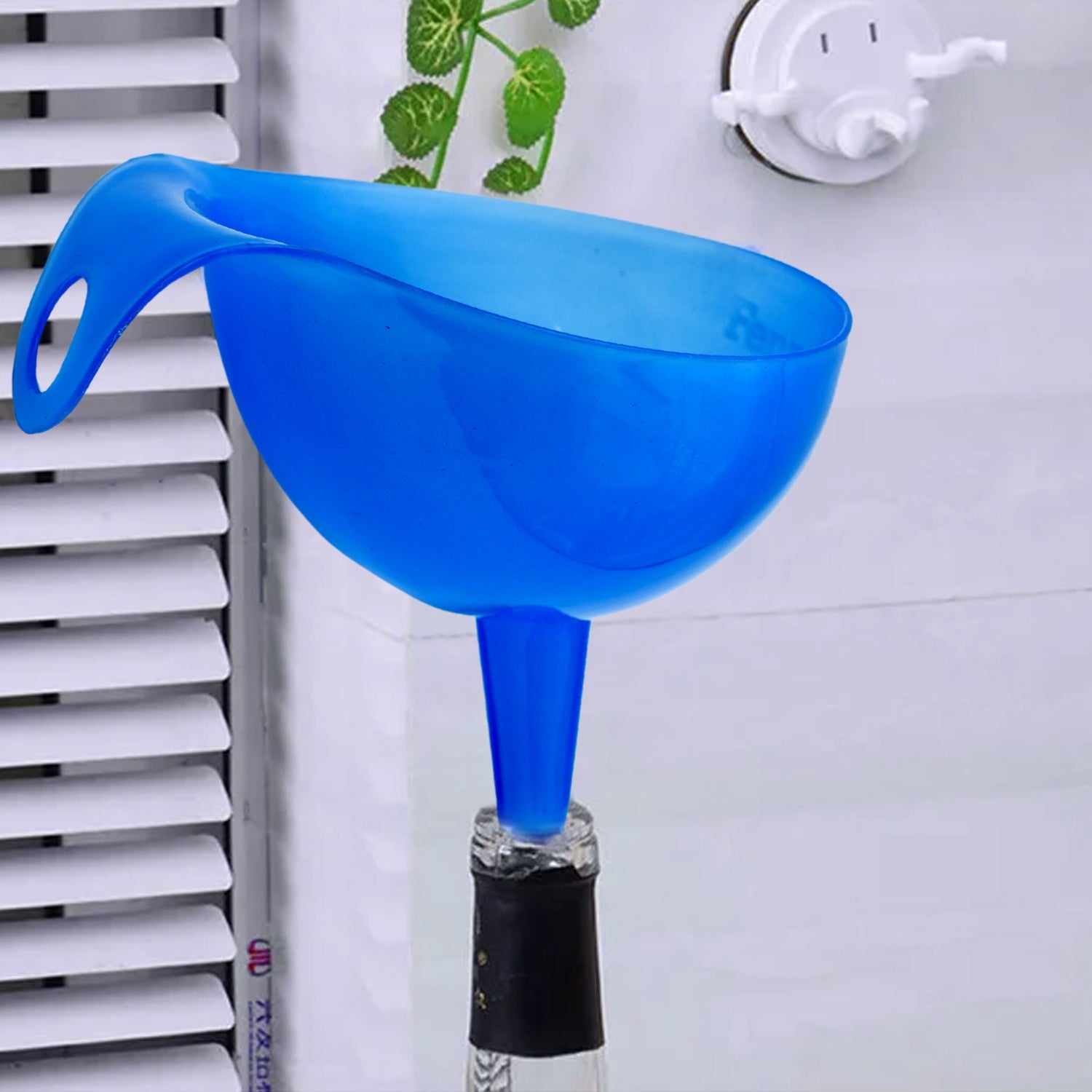 Easy-to-clean plastic funnel, safely placed in a dishwasher rack.