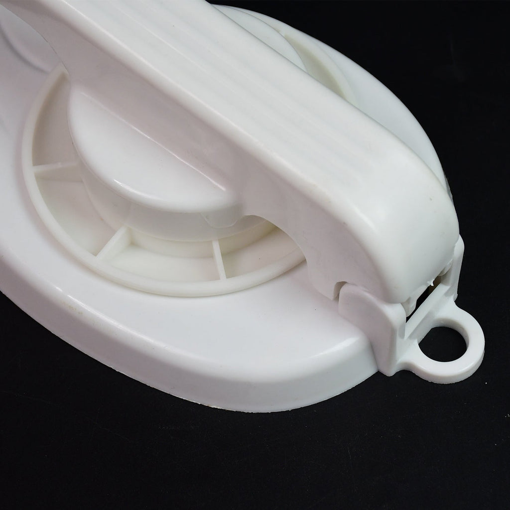 Close-up of the durable plastic surface of the Puri Press Maker, ideal for flatbreads.