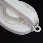 Close-up of the durable plastic surface of the Puri Press Maker, ideal for flatbreads.