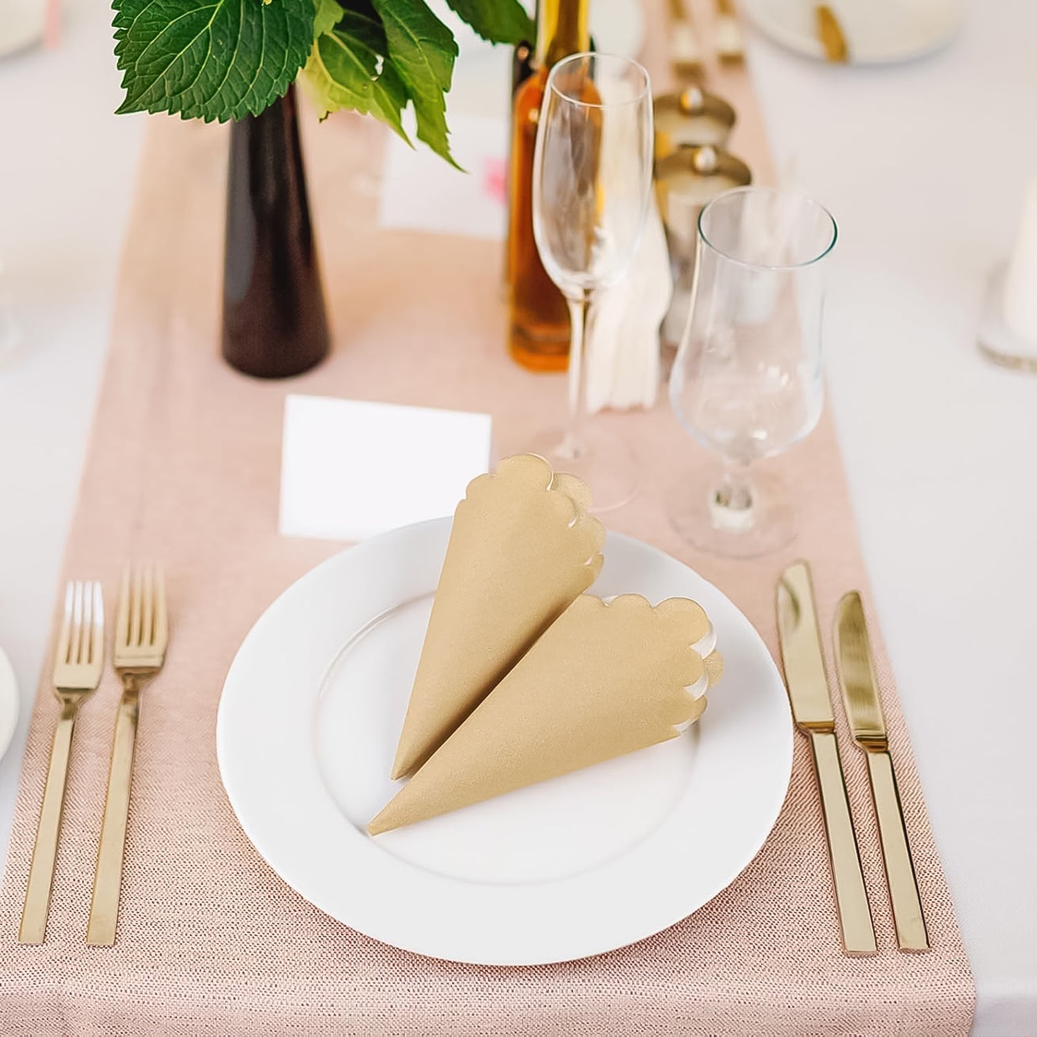 Close-up of scalloped edge napkin in brown and white dual color