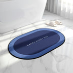 Soft textured oval bath mat designed for bathroom floors
