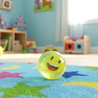 Close-up of smiley face water ball toy for sensory play
