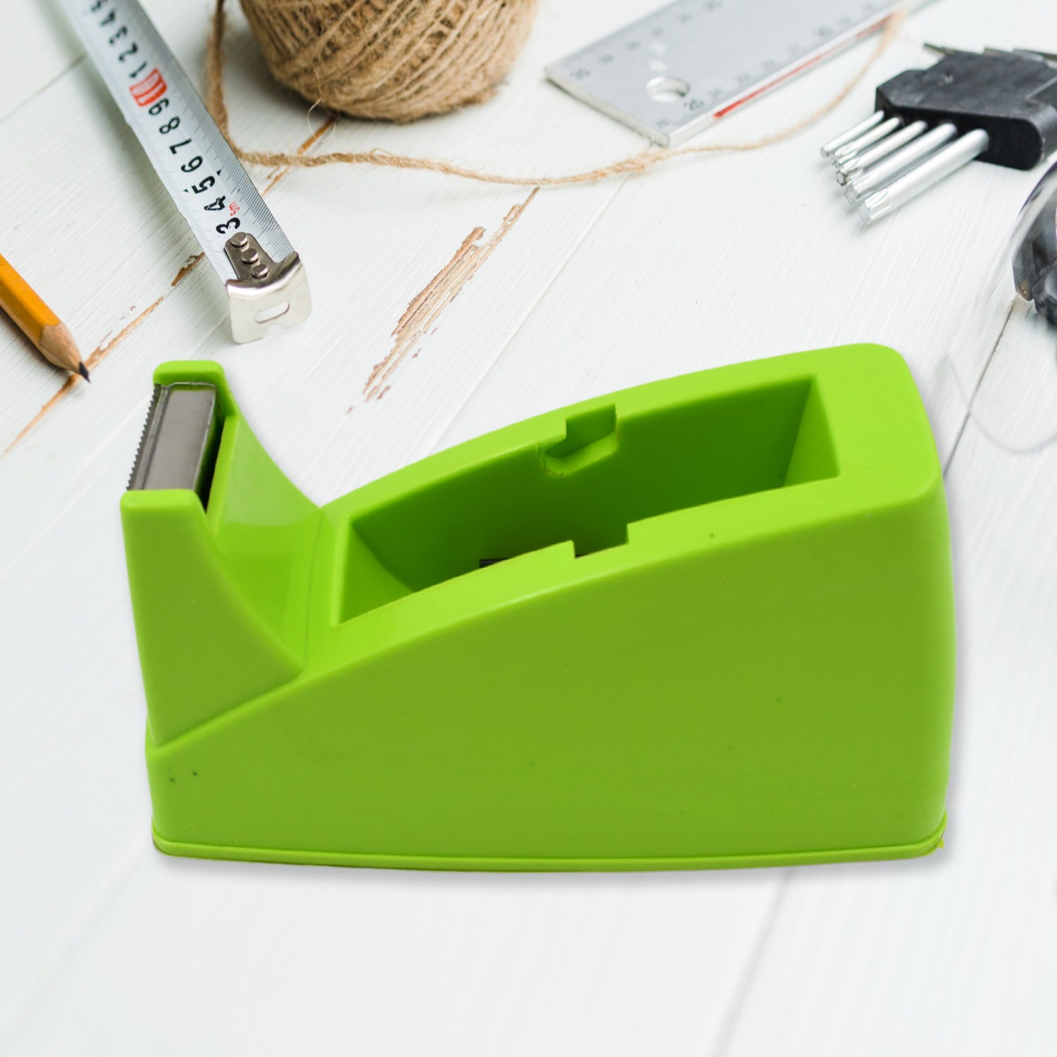 Top-down view of the plastic tape dispenser, ideal for office and school supplies.