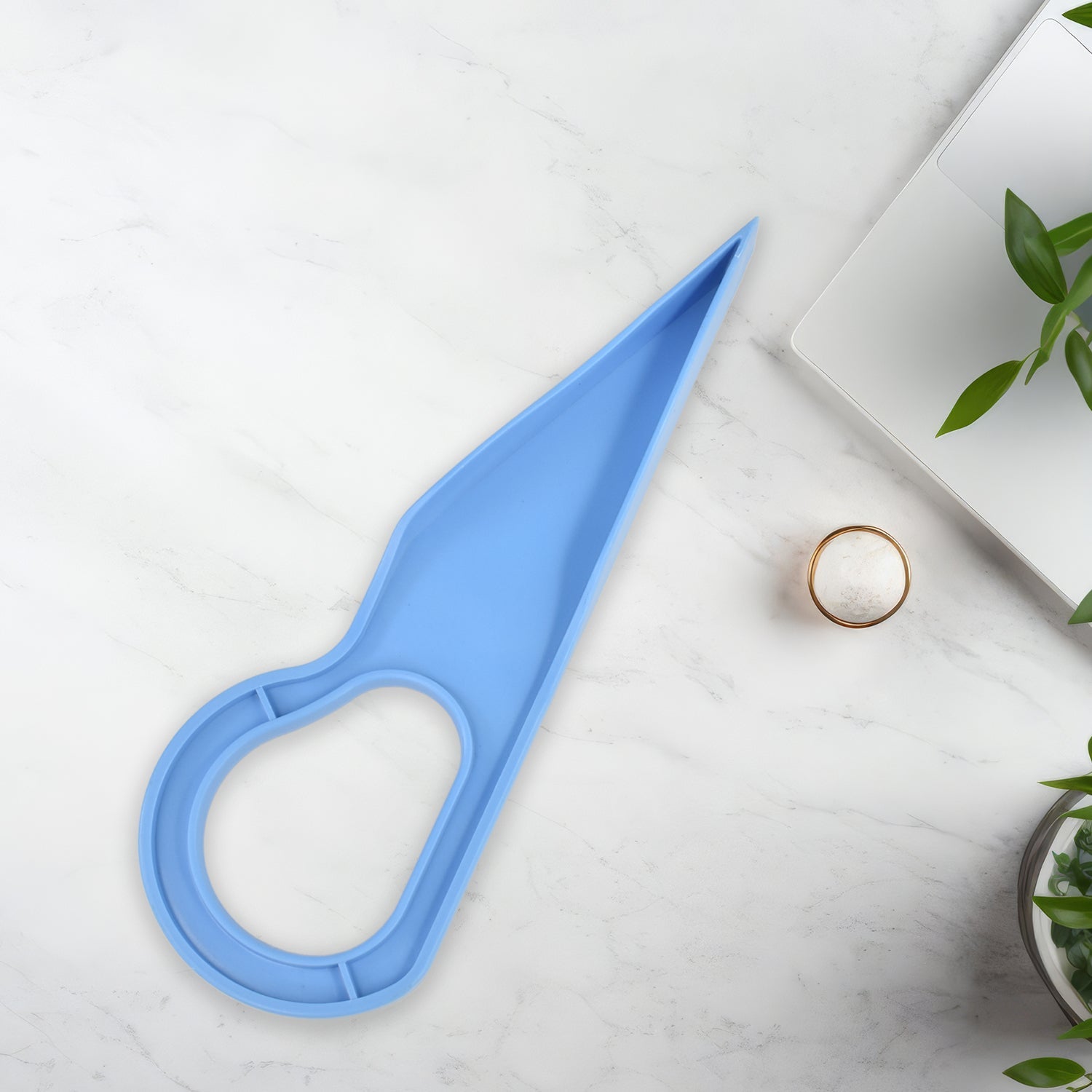 Close-up of mattress lifter tool showing ergonomic curved handle design