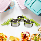 Hands closing the secure 4-side clip locks on a Ganesh Stainless Steel Tiffin Lunch Box.