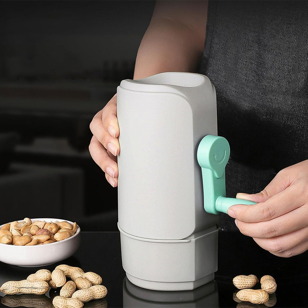 Side view of the manual peanut sheller, highlighting its sturdy design.