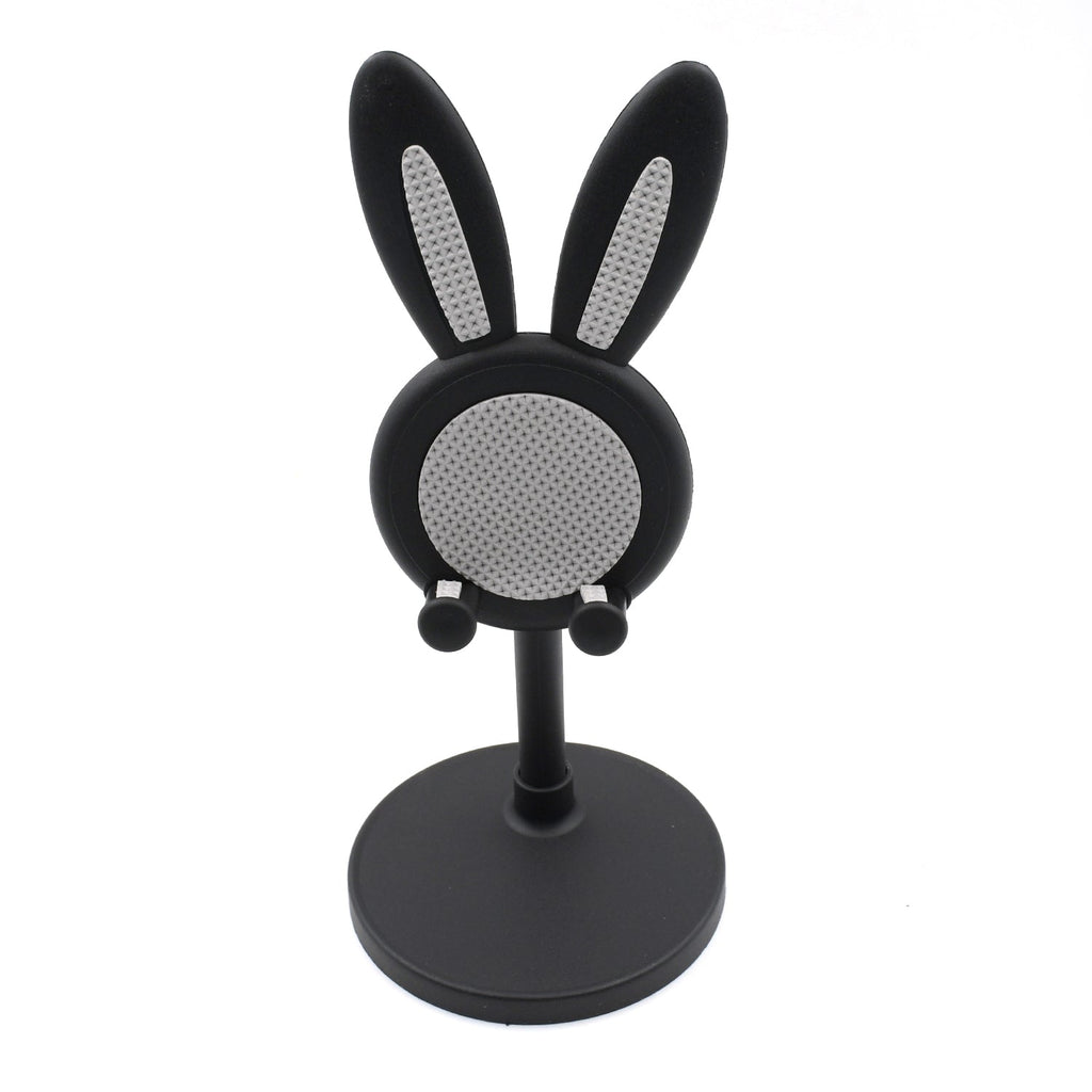 The Bunny Phone Stand in a home office setting, perfect for desk organization.
