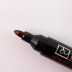 Red ink marker packaging showing product features and benefits