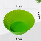 Brightly colored, flexible silicone baking molds shaped like cupcakes.