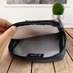 Angled view of multipurpose zipper pouch with ethnic art print