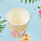 A hand holding one of the sturdy disposable tea coffee cups, showcasing its design.