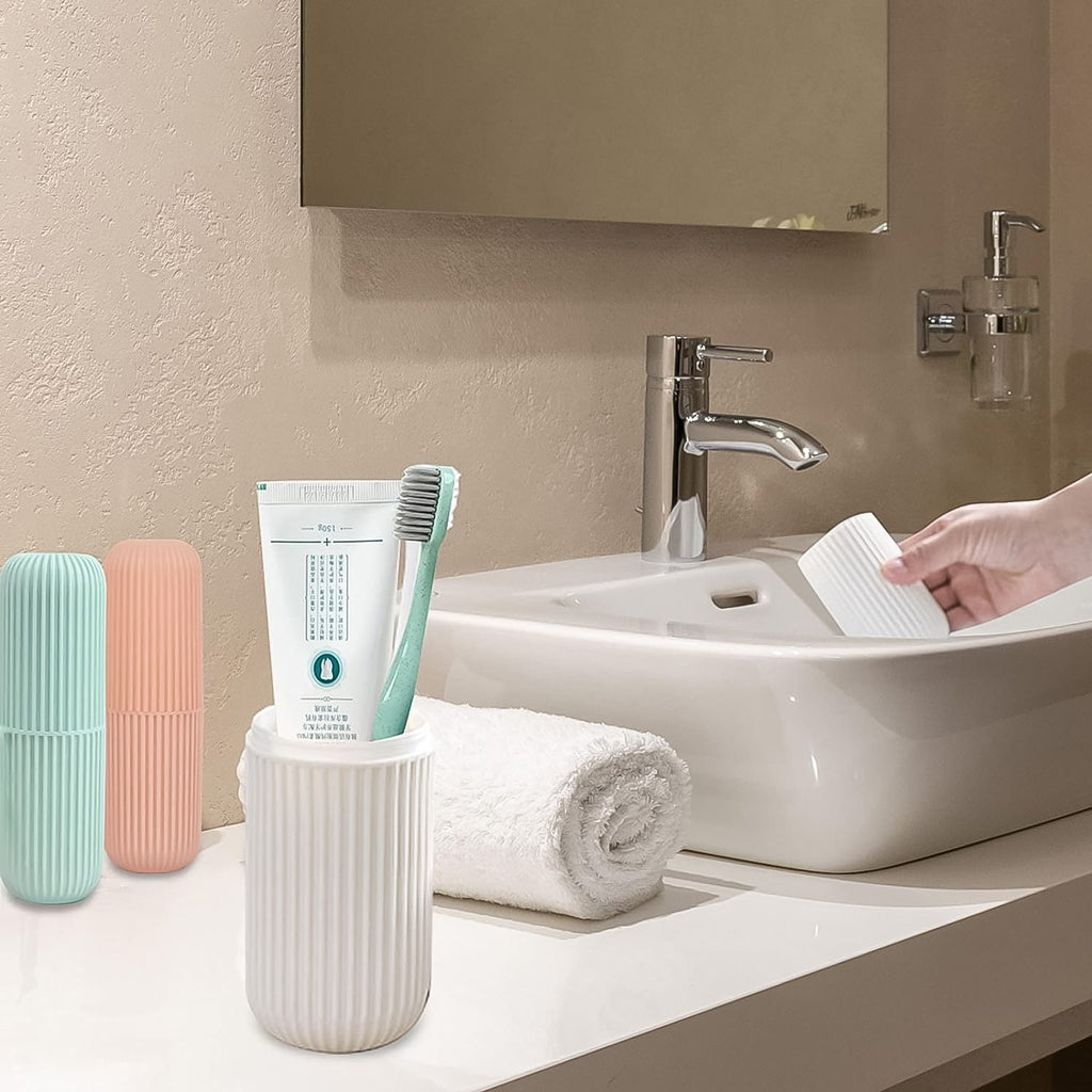 Blue travel toothbrush holder securely containing a toothbrush and toothpaste.