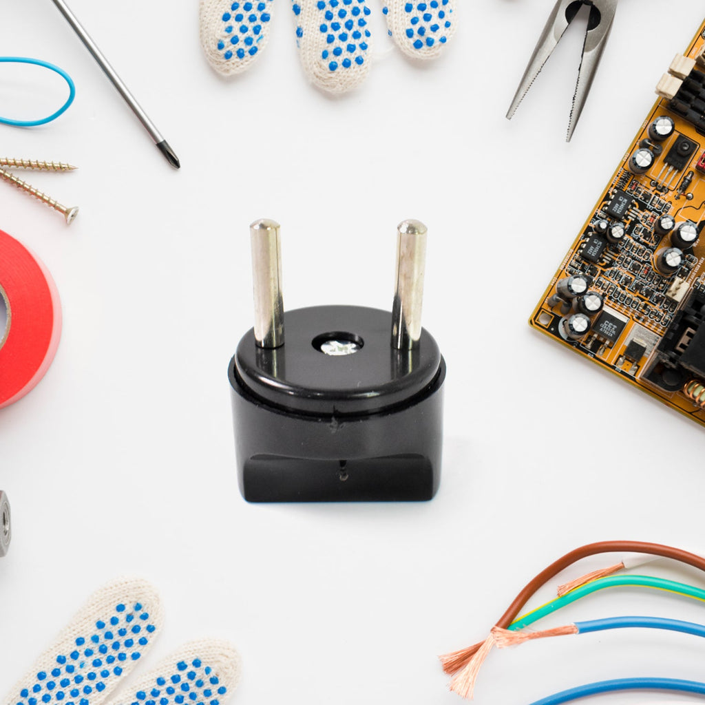 Close-up of 2 Pin Plug Adapter converter pins for Indian sockets