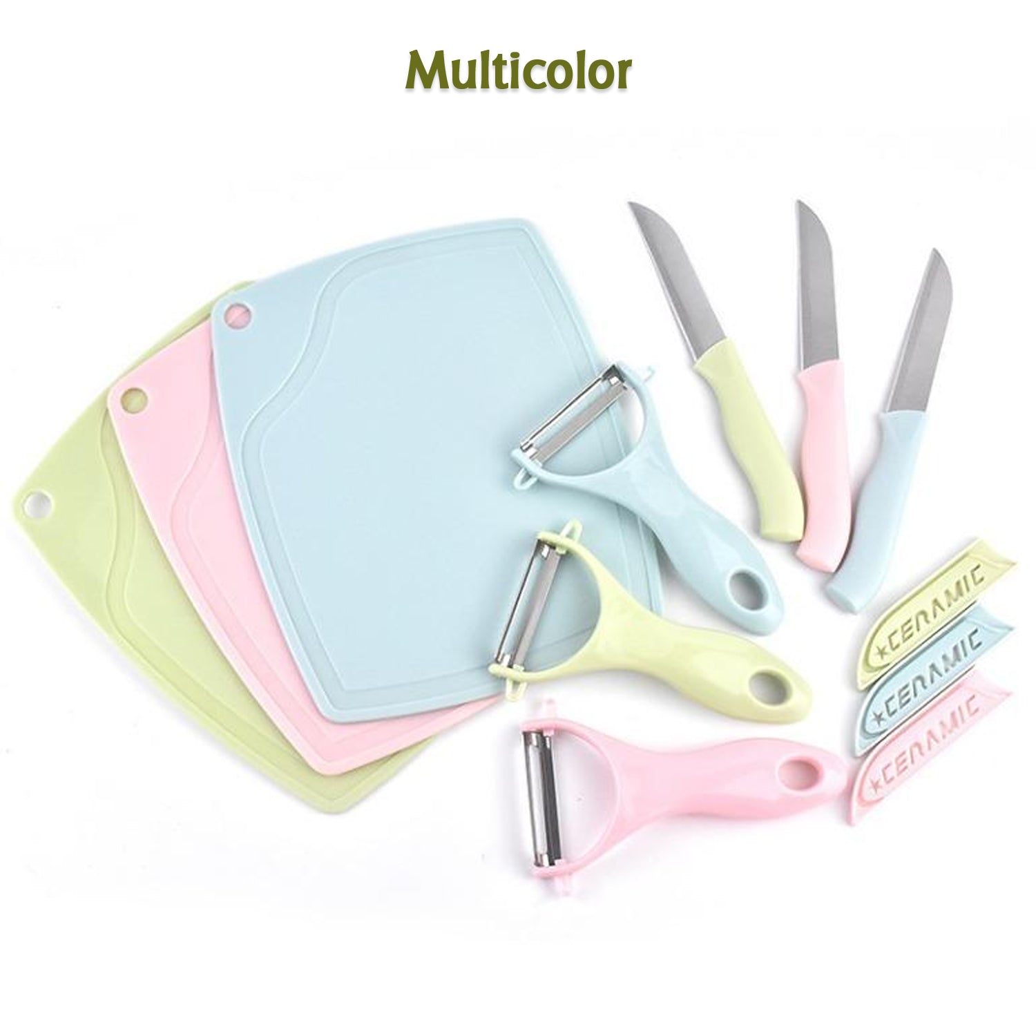 Green handled vegetable peeler displayed alongside the two sleek stainless steel knives.