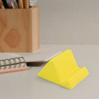 Lightweight plastic mobile phone holder designed for desktop use and video watching