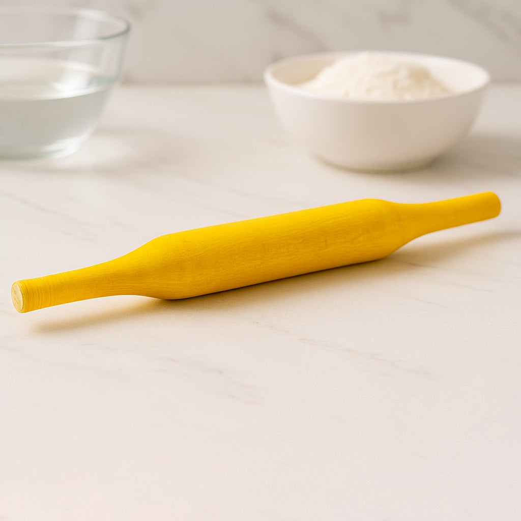Hands skillfully using the Bombay belan to flatten dough for perfect rotis.