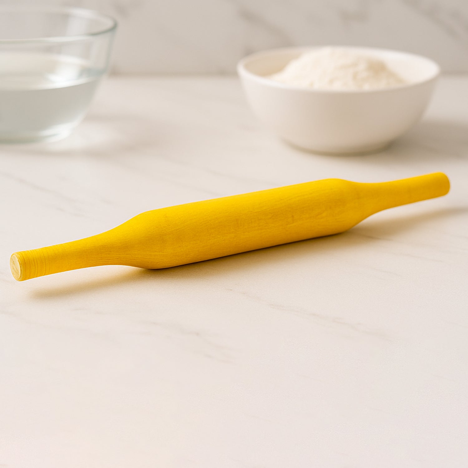 Hands skillfully using the Bombay belan to flatten dough for perfect rotis.