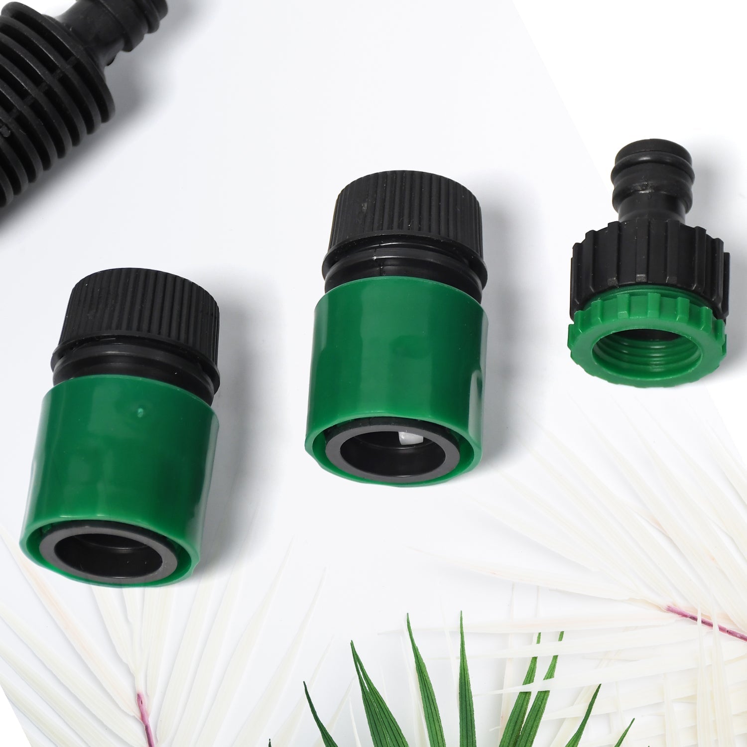 Detailed view of the water hose lock nozzle with its secure locking mechanism.