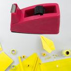 Side profile of compact plastic tape dispenser