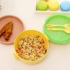 Complete set: burger shape lunch box with integrated spoon and fork.