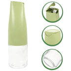 Side view of the sleek 500ml oil dispenser bottle in a kitchen setting.