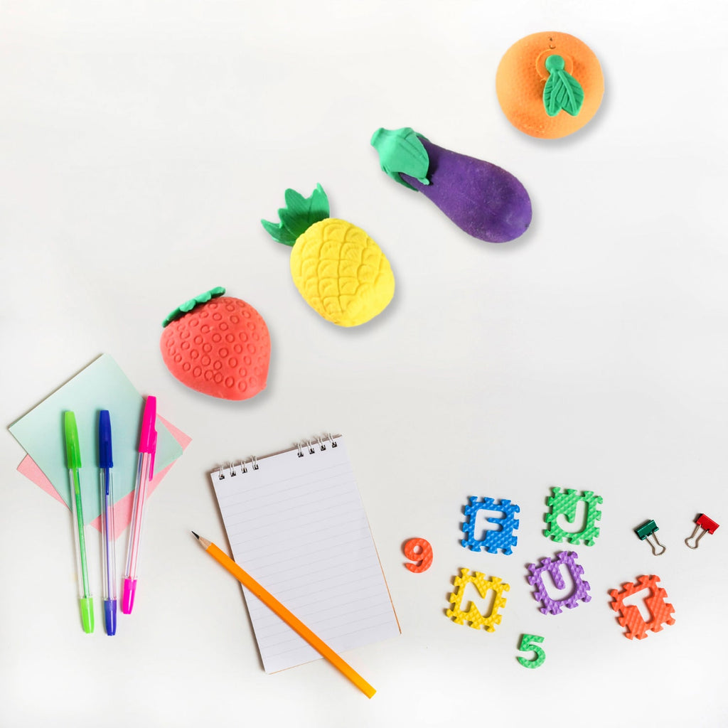 Detailed close-up shot of colorful mini fruit and vegetable erasers.