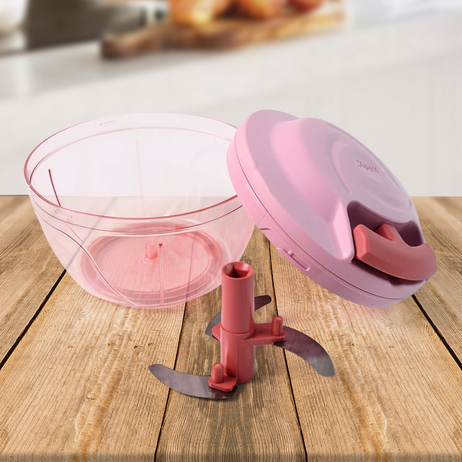 Transparent container with chopped vegetables inside hand-pull chopper