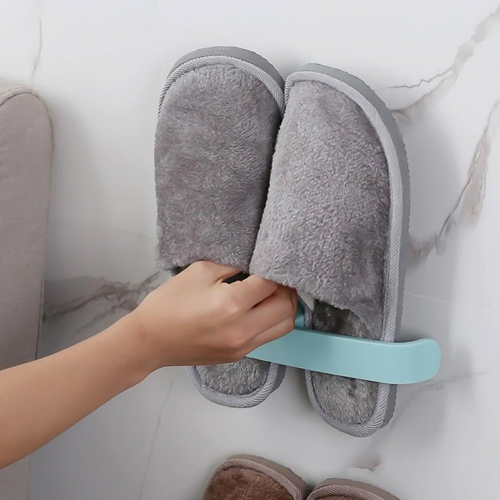 Angled view of the easy-to-install wall-mounted towel and slipper rack, ready for use.