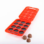 Durable plastic egg carrier box for safe storage.