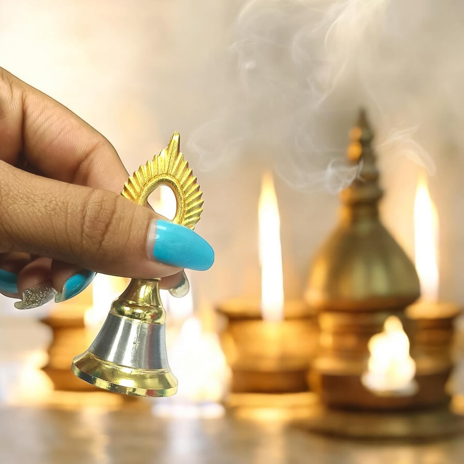 Brass and steel temple pooja bell with elegant golden and silver detailing