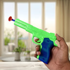 Close-up of the toy gun with a soft suction dart attached, demonstrating safety.