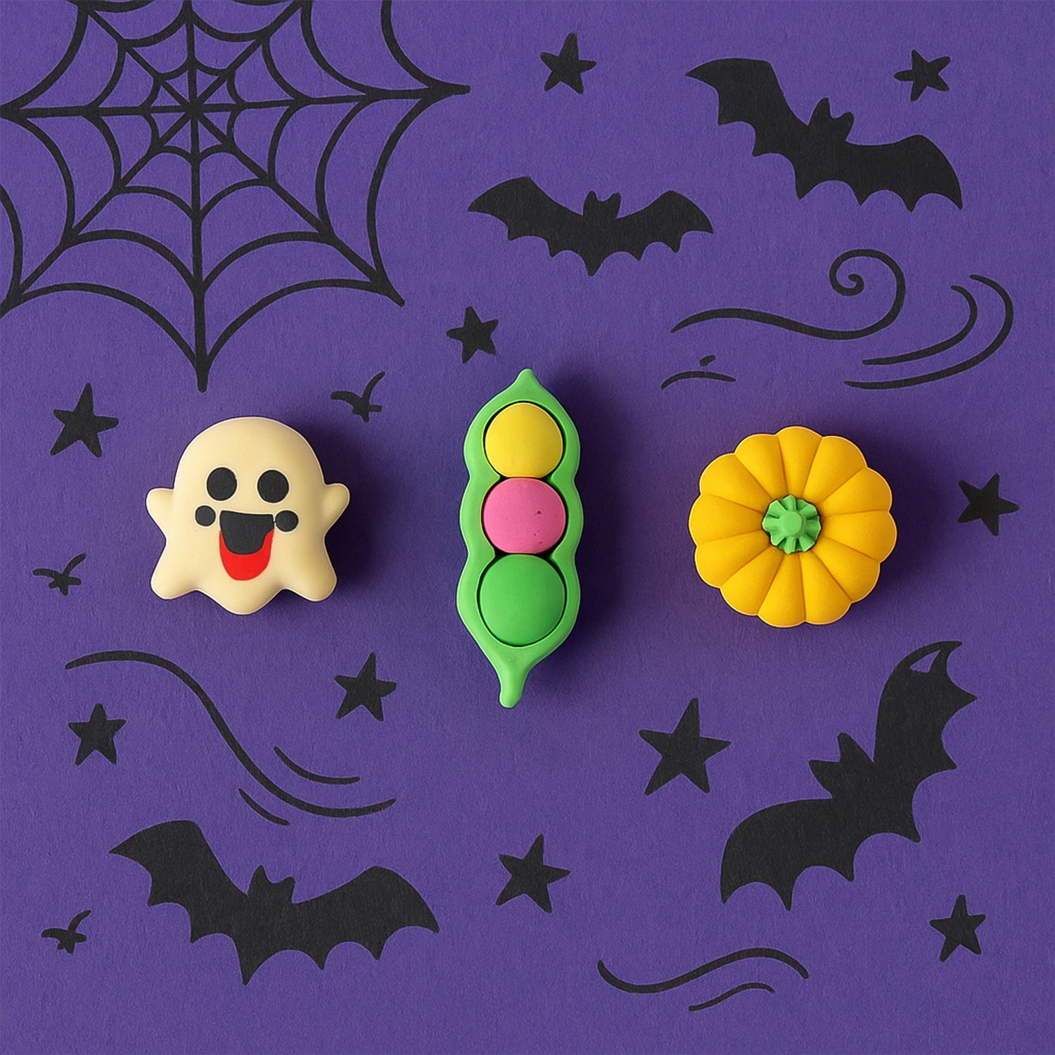 Multiple soft rubber cartoon erasers in different playful shapes, perfect for school stationery.