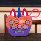 Back view of the Mini Push Bubbles Game, highlighting its compact design.
