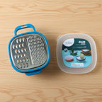 Manual food grater with container storage box