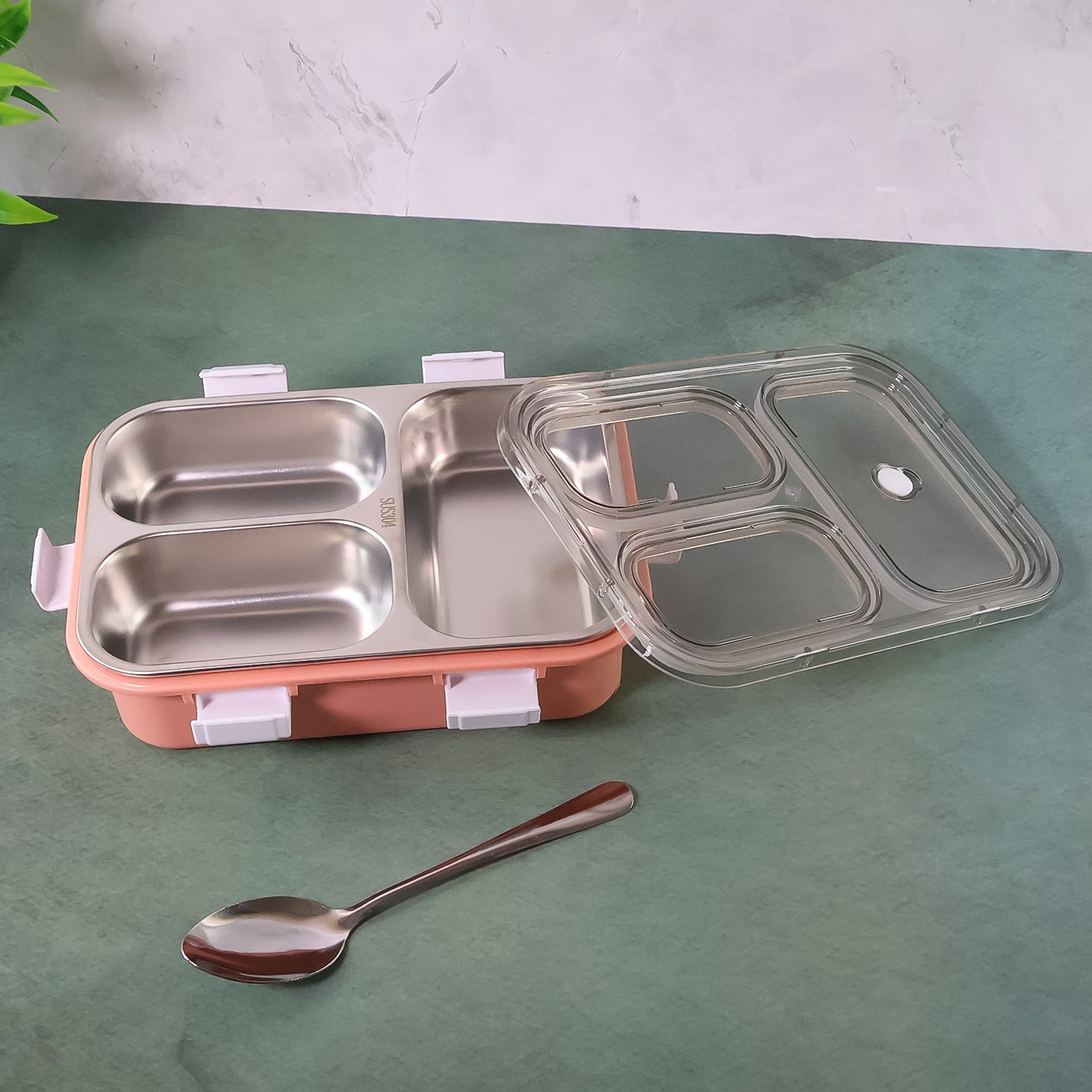 Side view of the portable lunch box, demonstrating its compact size for bags.