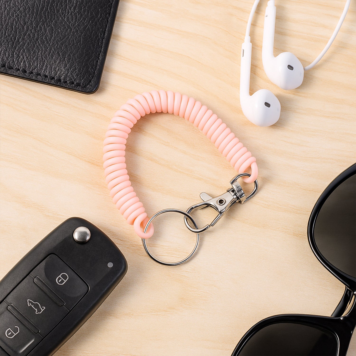 Flexible plastic spiral keychain bracelet offering hands-free convenience