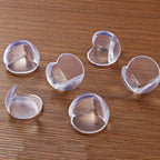 Child-proof corner guards protecting against sharp furniture edges.