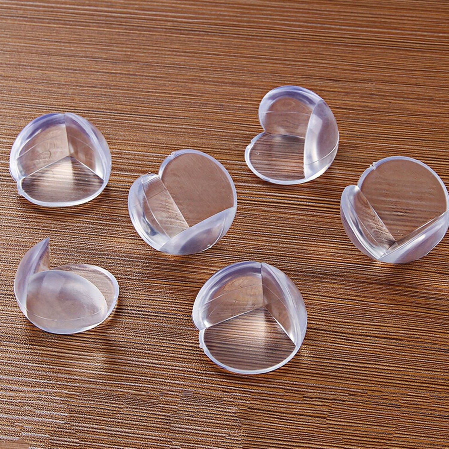 Child-proof corner guards protecting against sharp furniture edges.