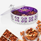 Elegant round silver dry fruit box with four compartments, perfect for serving.