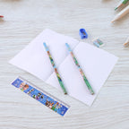 Detailed view of the cartoon-themed eraser and scale from the Kids Stationery Kit.
