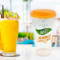 A sleek portable plastic coffee cup with a secure lid on a clean background.