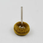 Close-up of the versatile abrasive buffing wheel set.