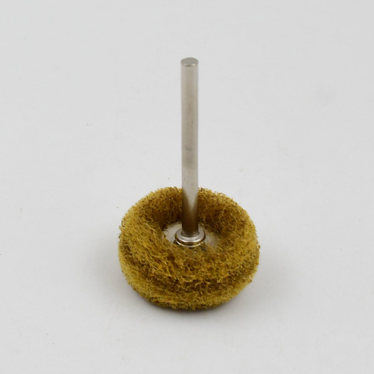Close-up of the versatile abrasive buffing wheel set.